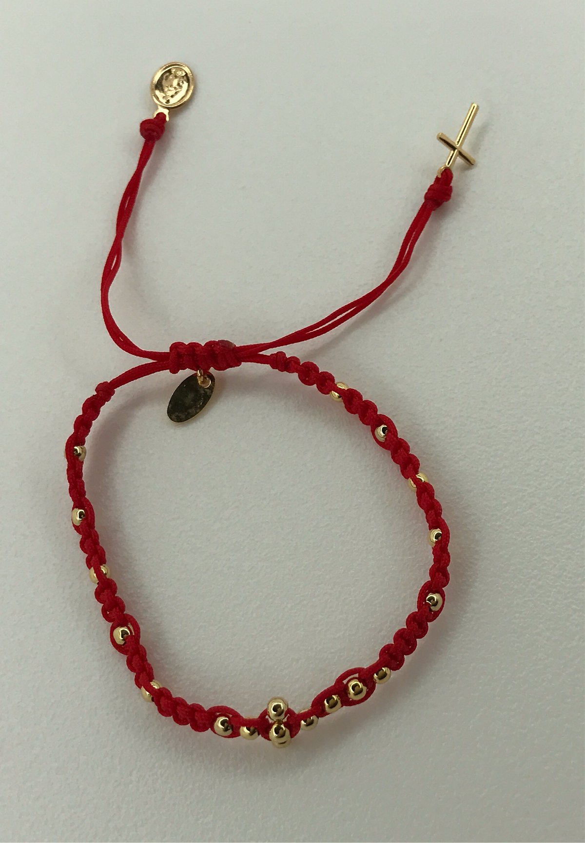 Red/Tan bracelets W/golden mini beads and cross