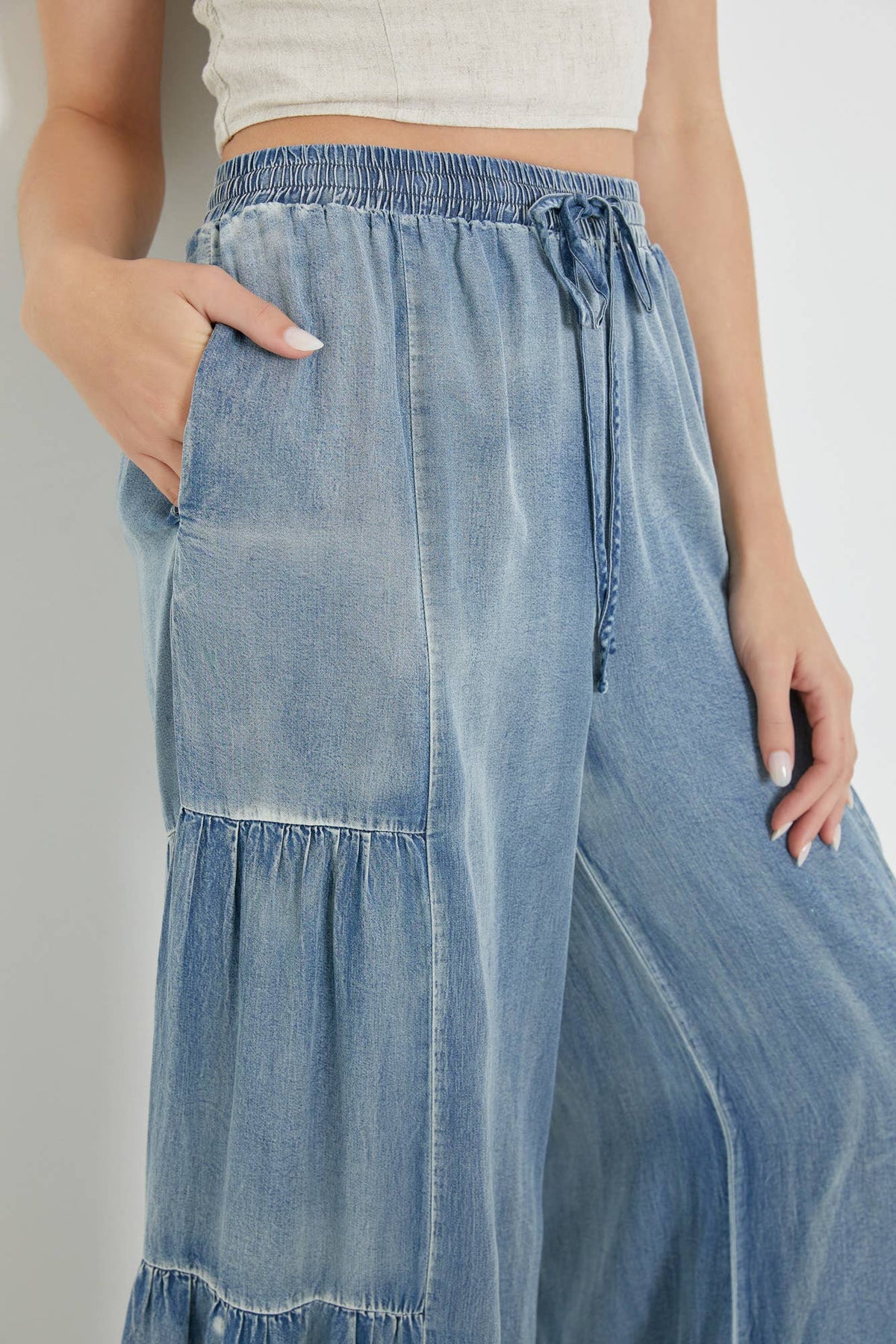 RUFFLED SIDE WASHED DENIM WIDE PANTS