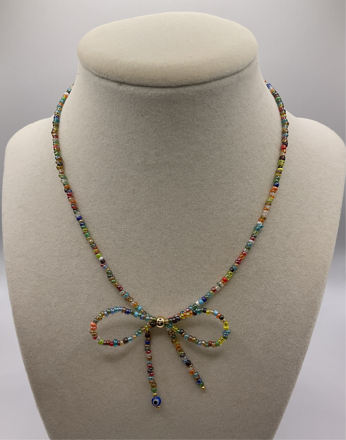 Necklaces W/ beaded laces multi colored/eye on end