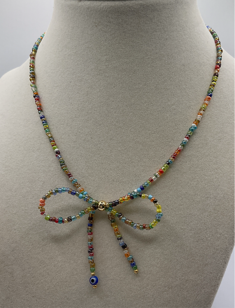 Necklaces W/ beaded laces multi colored/eye on end