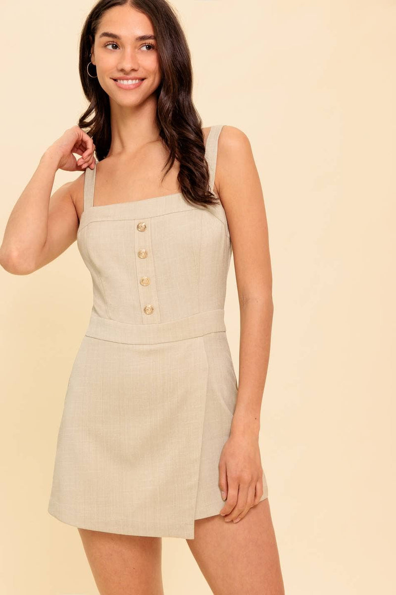 A solid woven romper