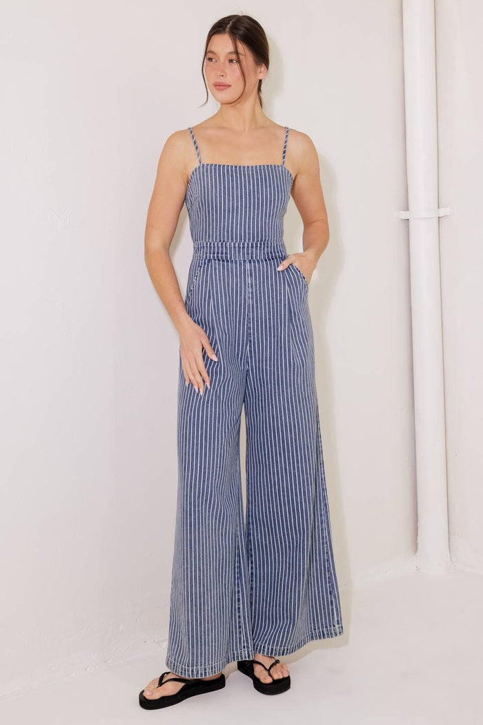 A washed striped denim jumpsuit