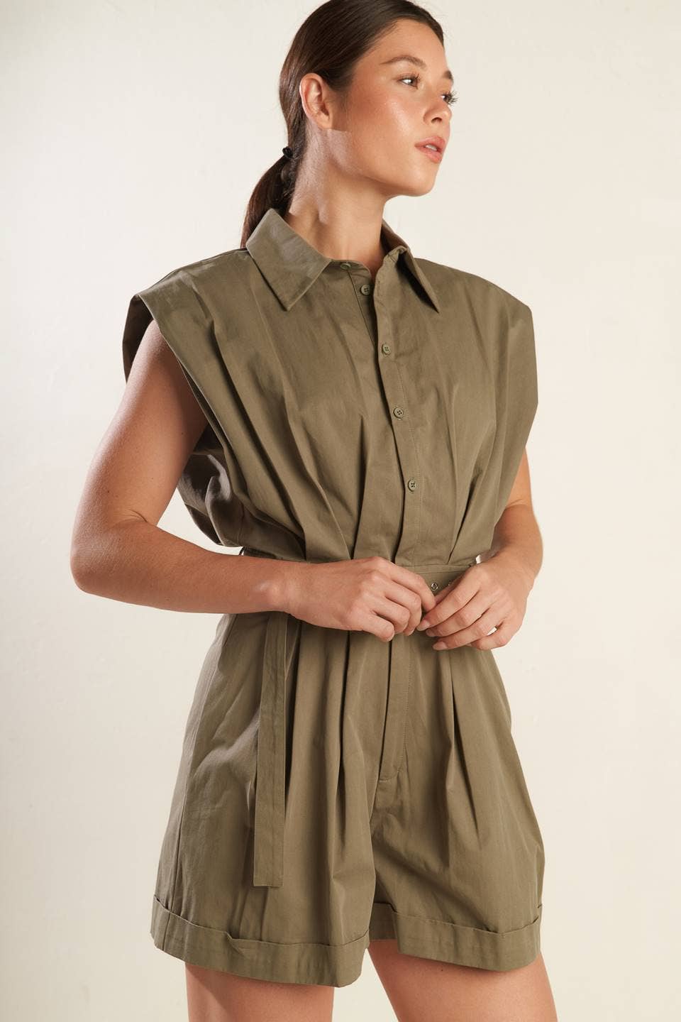 A solid woven romper
