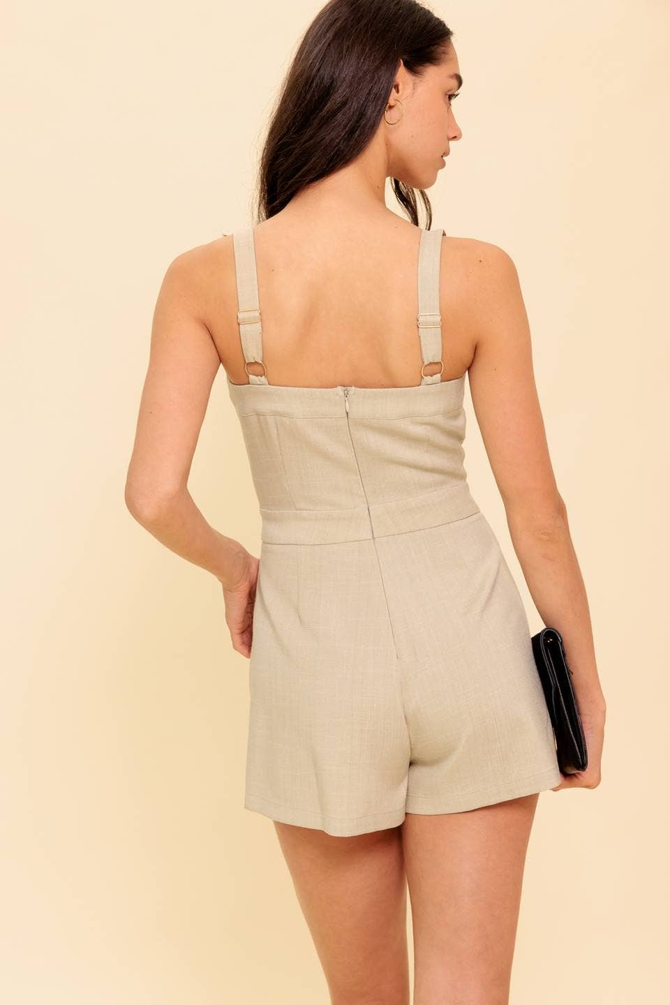 A solid woven romper