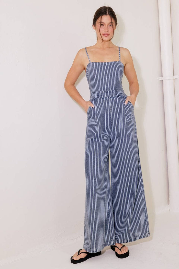 A washed striped denim jumpsuit