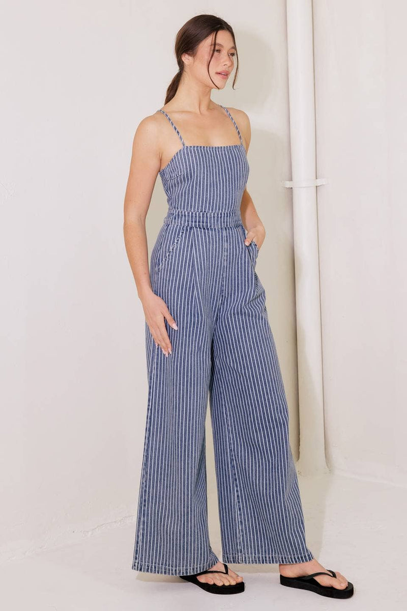 A washed striped denim jumpsuit
