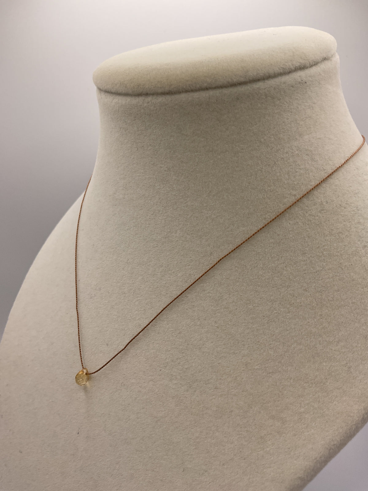 Thin String W/ Yellow Droplet Gem