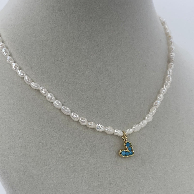 Pearl Stone W/ Small Gold Beads & Blue Heart Gem