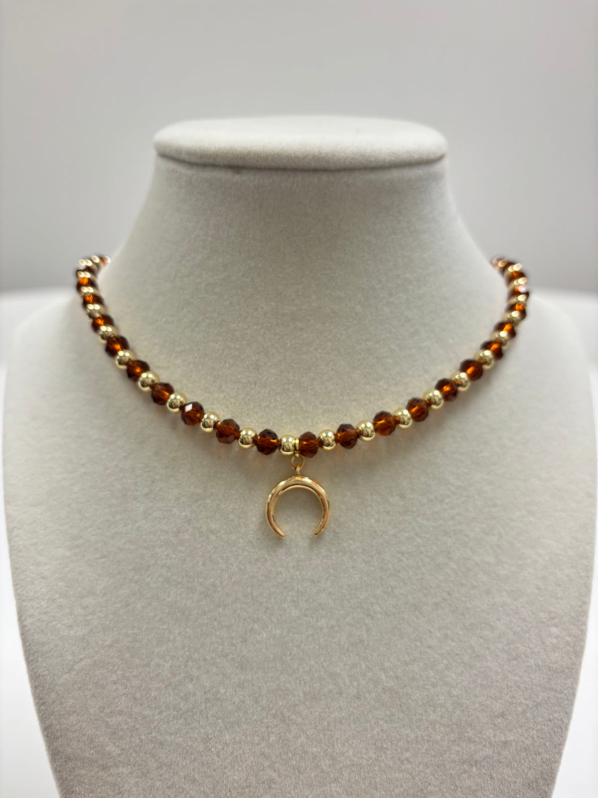 Brown Beads With Shiny Small Gold Charm Necklace