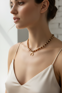 Brown Beads With Shiny Small Gold Charm Necklace