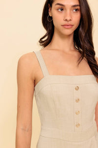 A solid woven romper