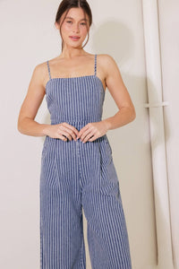 A washed striped denim jumpsuit